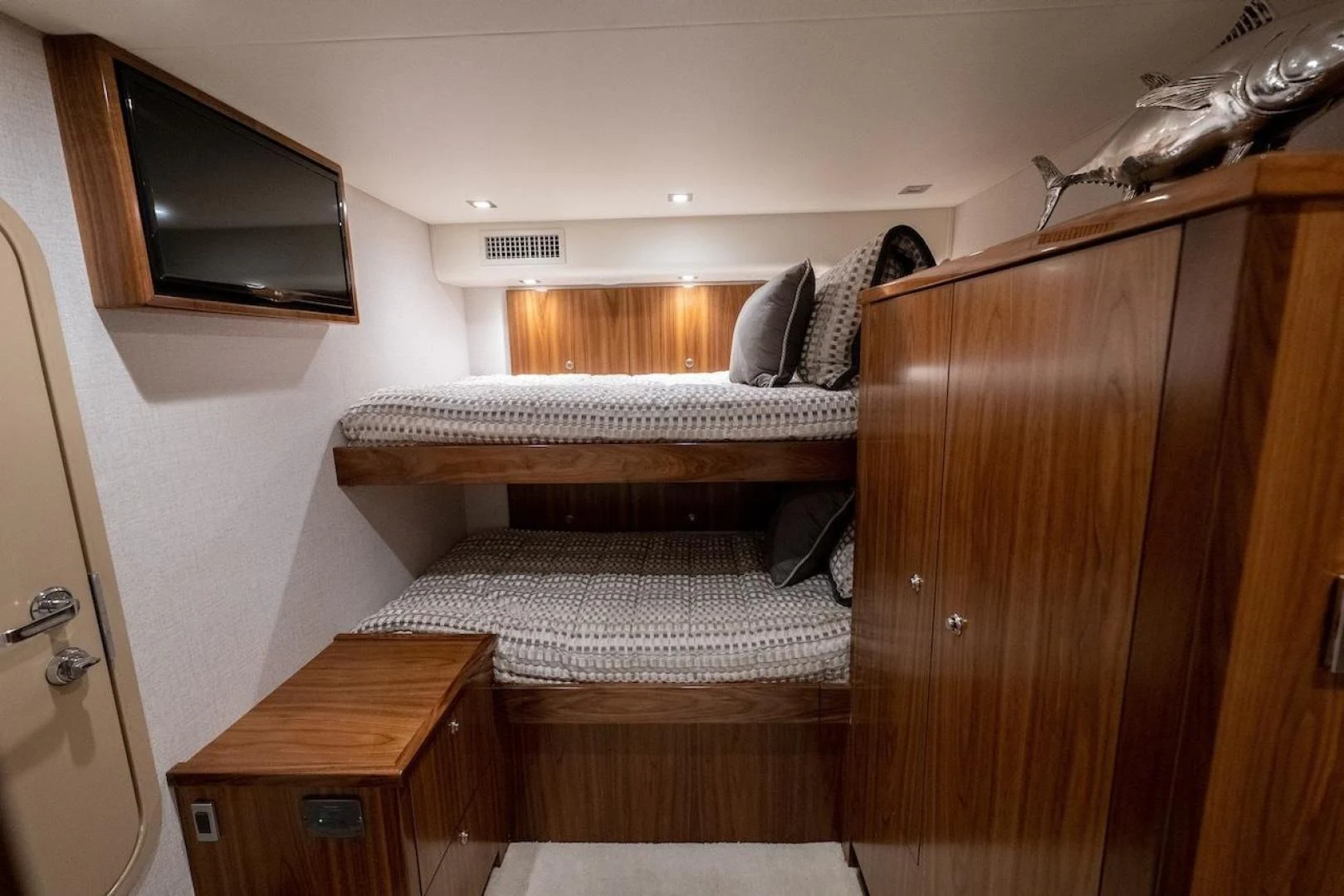a bed in a room aboard GAME ON Yacht for Sale