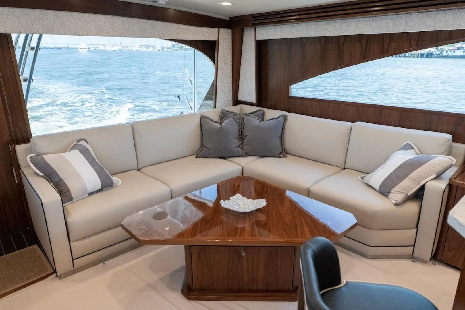 a living room with a large window aboard GAME ON Yacht for Sale