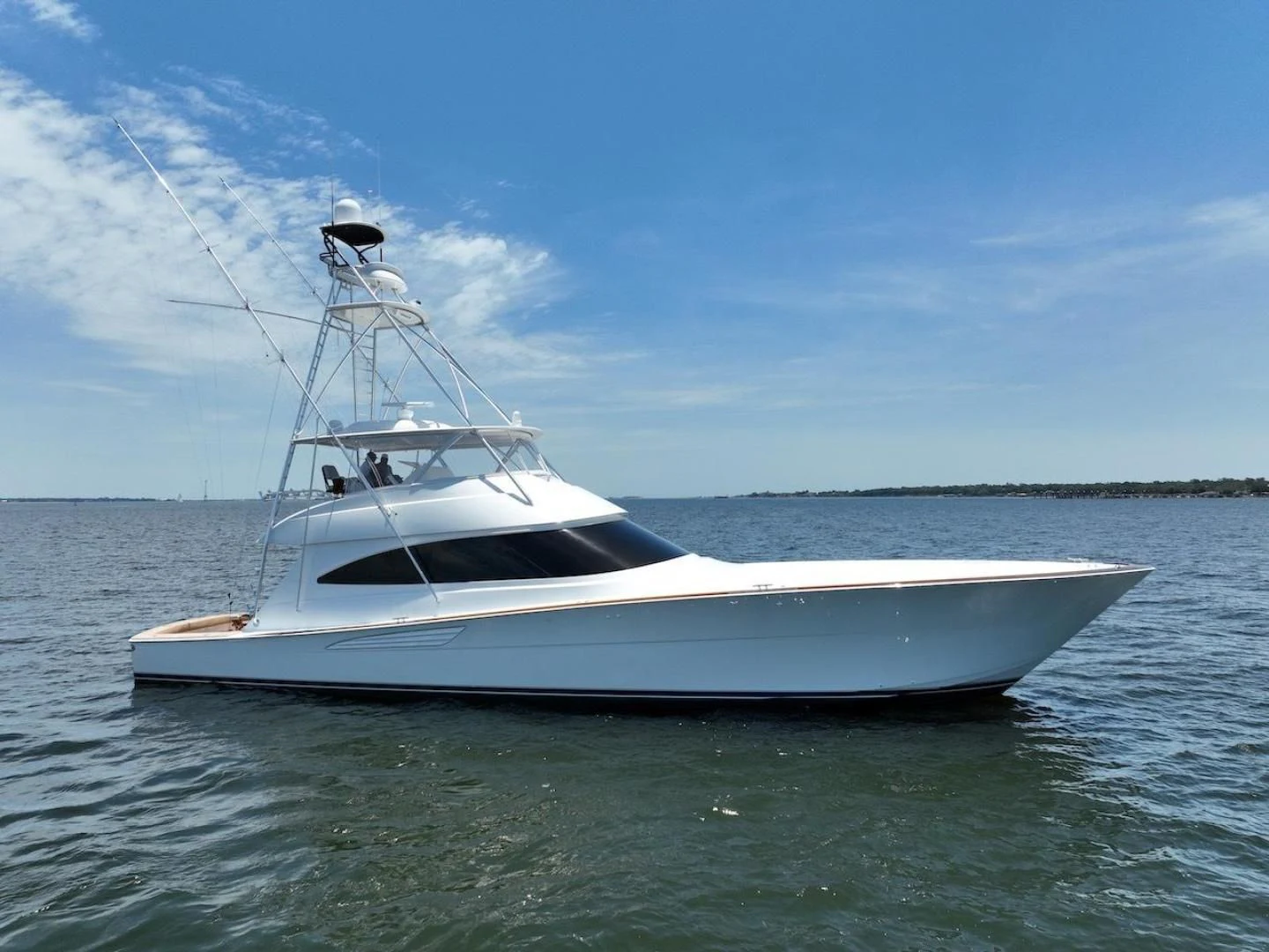 a white boat in the water aboard GAME ON Yacht for Sale