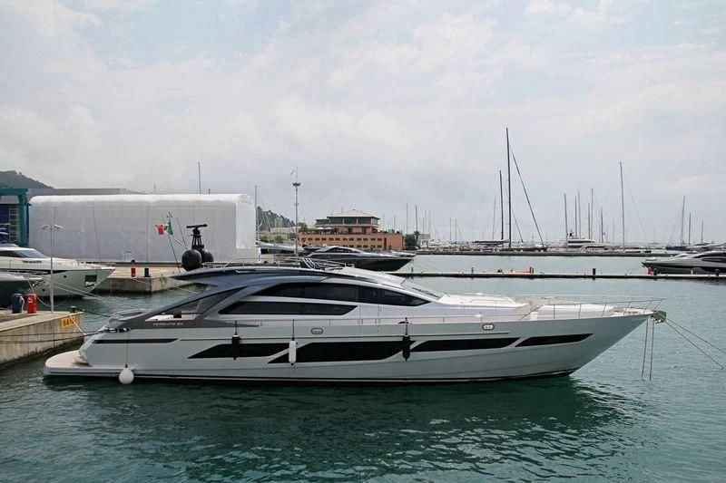 a white boat in the water aboard NAJATI Yacht for Sale