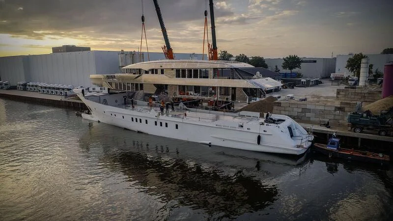 a large white boat in a body of water aboard SOLEMATES Yacht for Sale