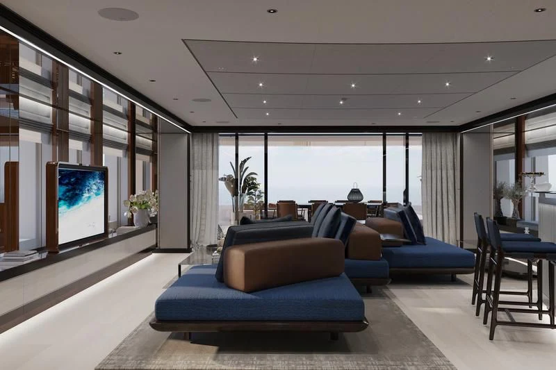 a living room with blue couches aboard SOLEMATES Yacht for Sale