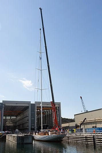 a tall metal crane next to a boat aboard HALEKAI Yacht for Sale