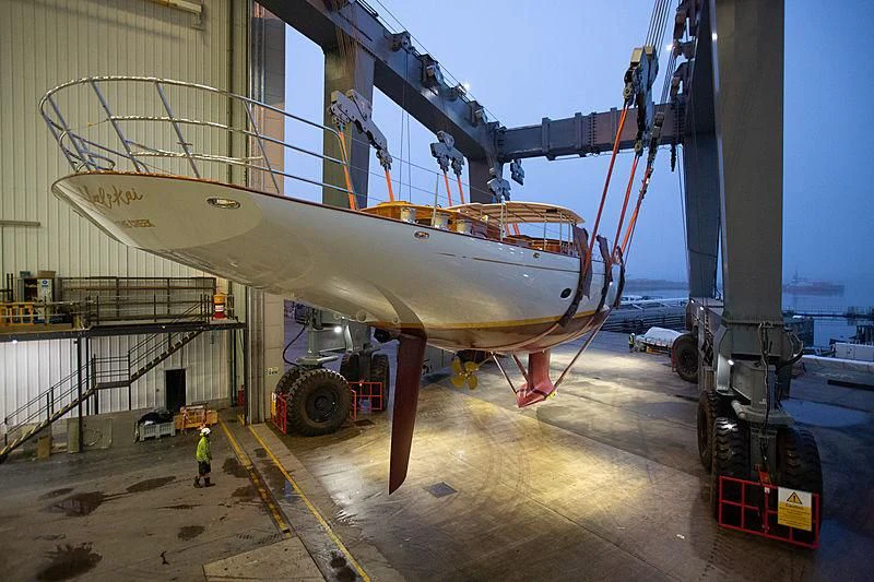 a large airplane in a warehouse aboard HALEKAI Yacht for Sale