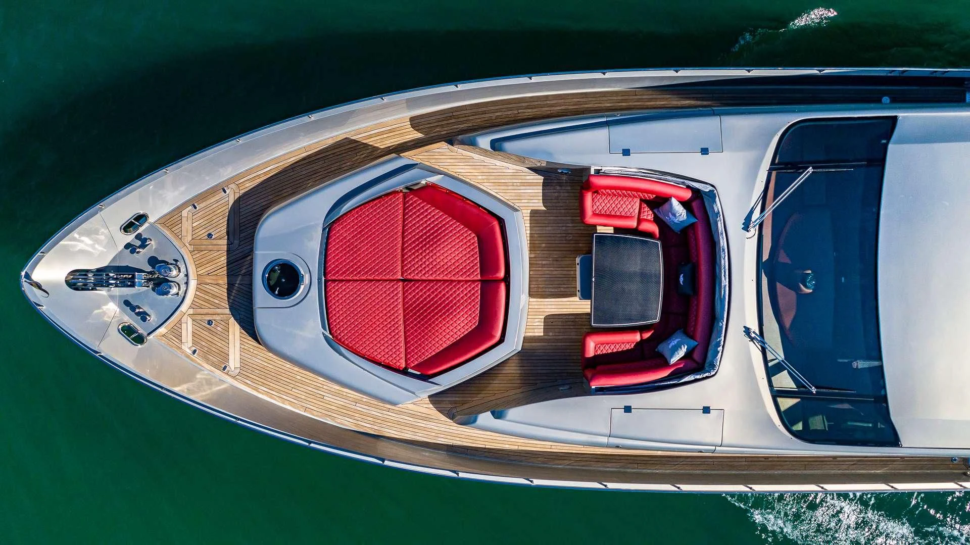 a car with a red and white roof aboard REGAL Yacht for Sale