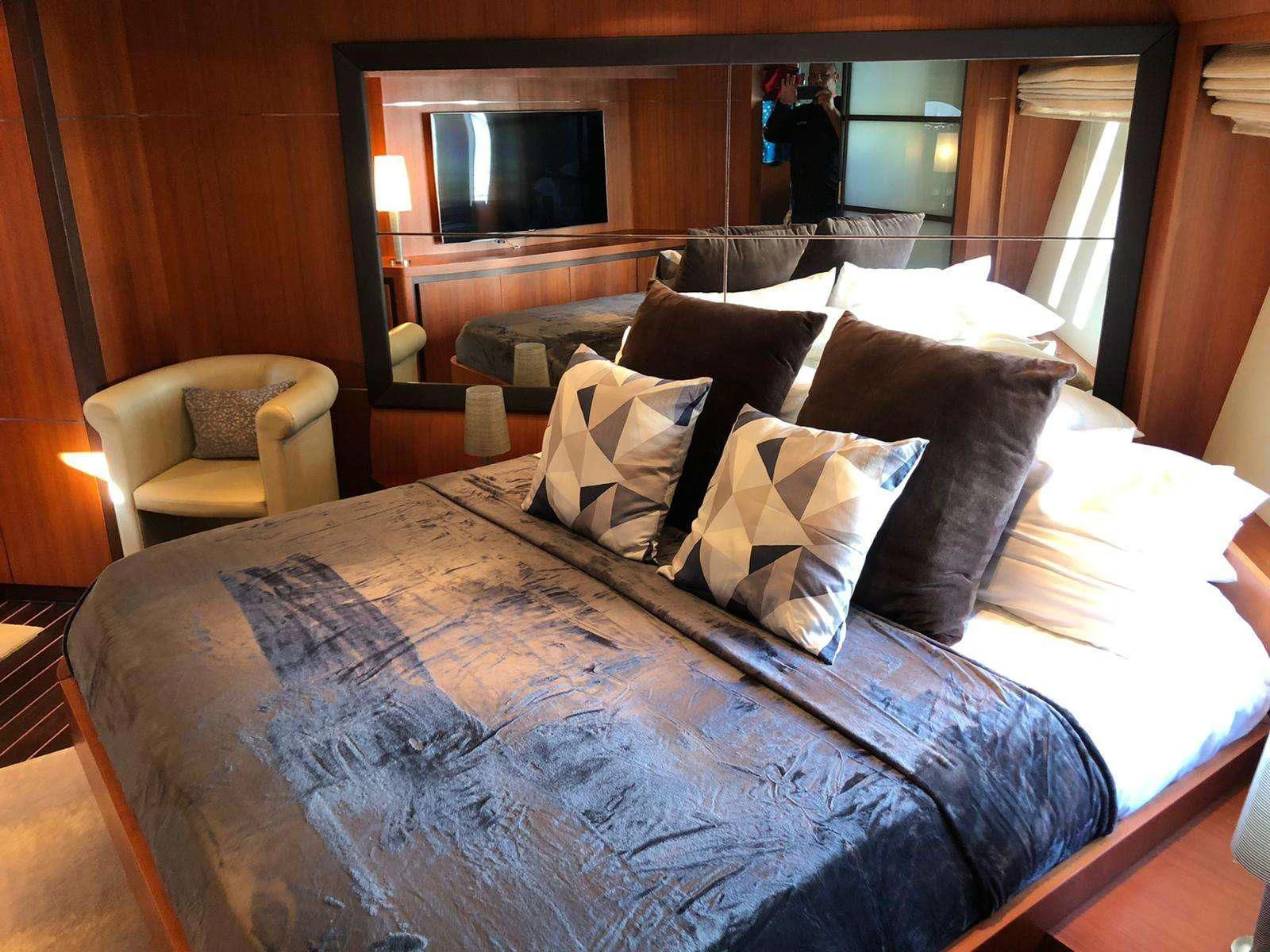 a bed with pillows aboard REGAL Yacht for Sale