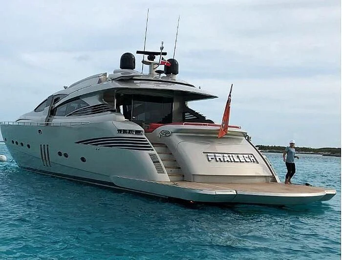 a person standing on a boat aboard REGAL Yacht for Sale