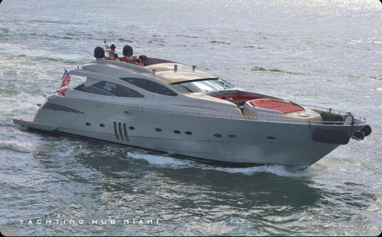 a white boat in the water aboard REGAL Yacht for Sale