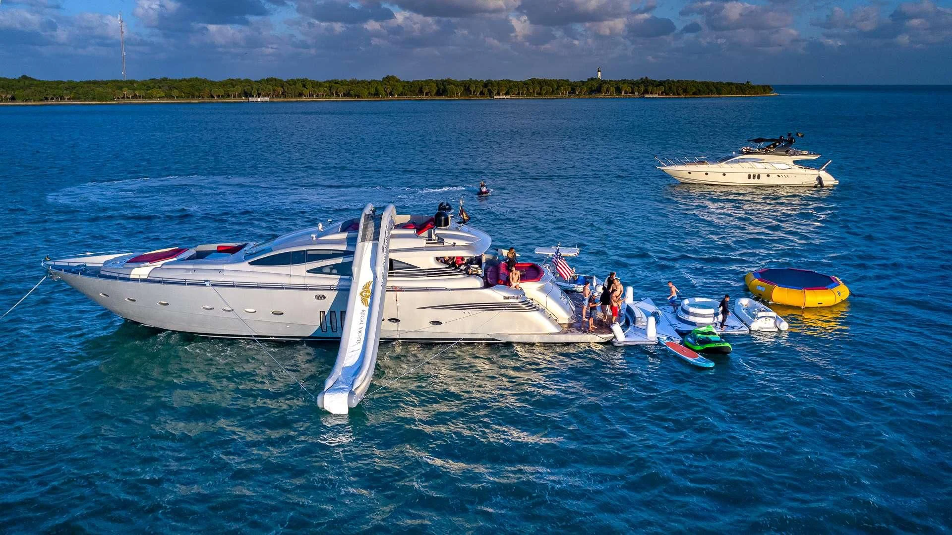 a group of people on a boat aboard REGAL Yacht for Sale