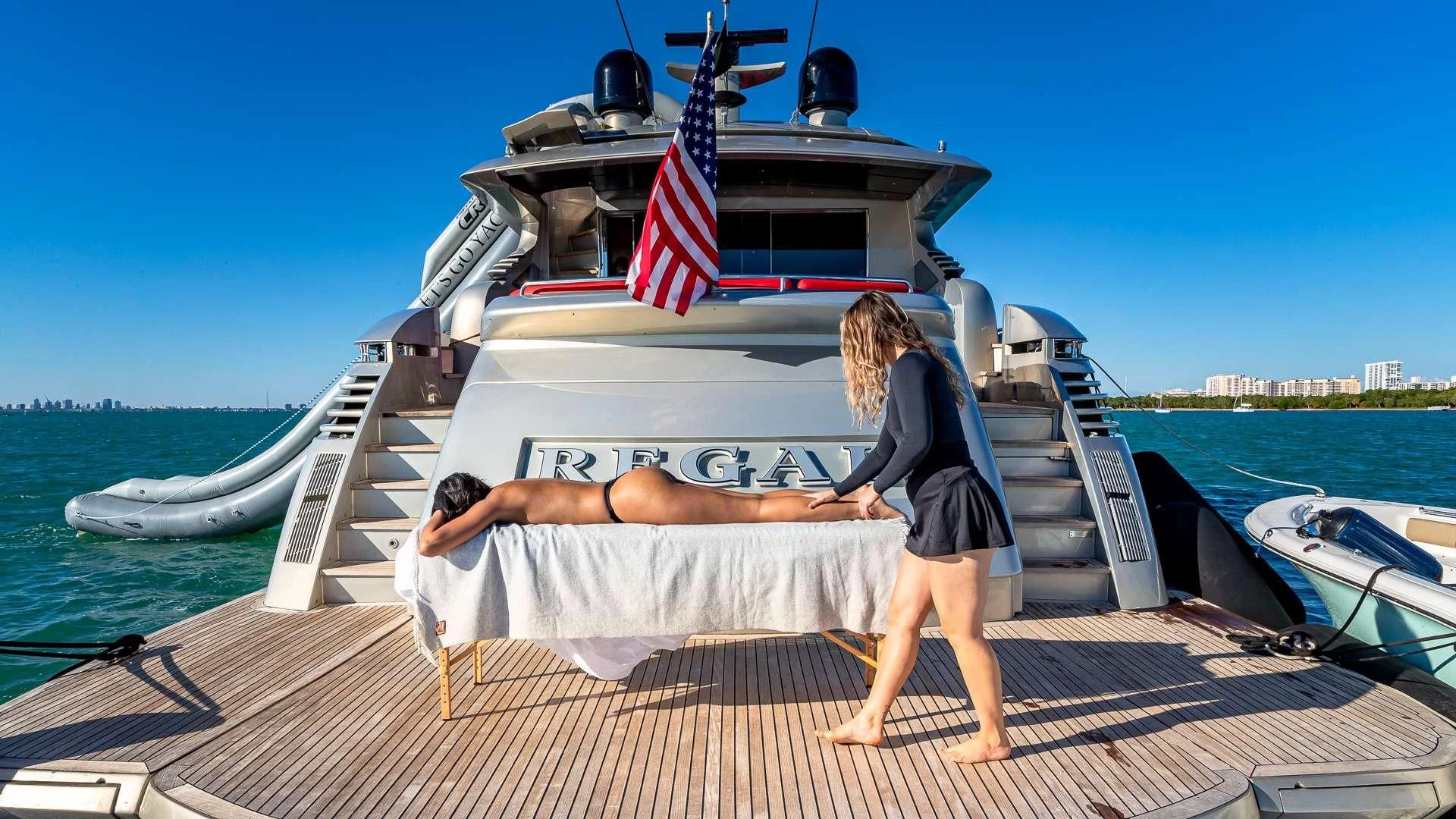 a person standing on a boat aboard REGAL Yacht for Sale