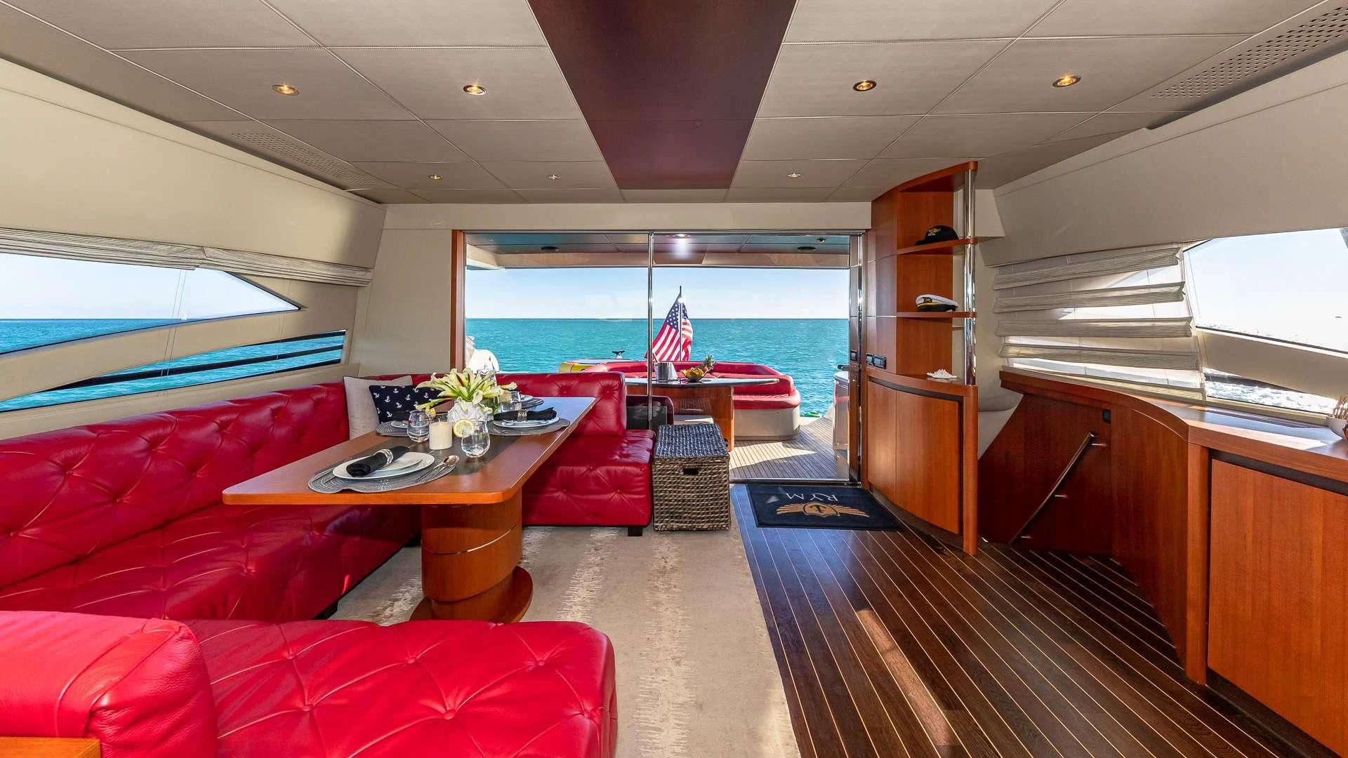 a room with a table and chairs aboard REGAL Yacht for Sale