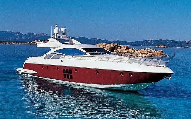 a white and red boat in the water aboard PLANE II SEA Yacht for Sale