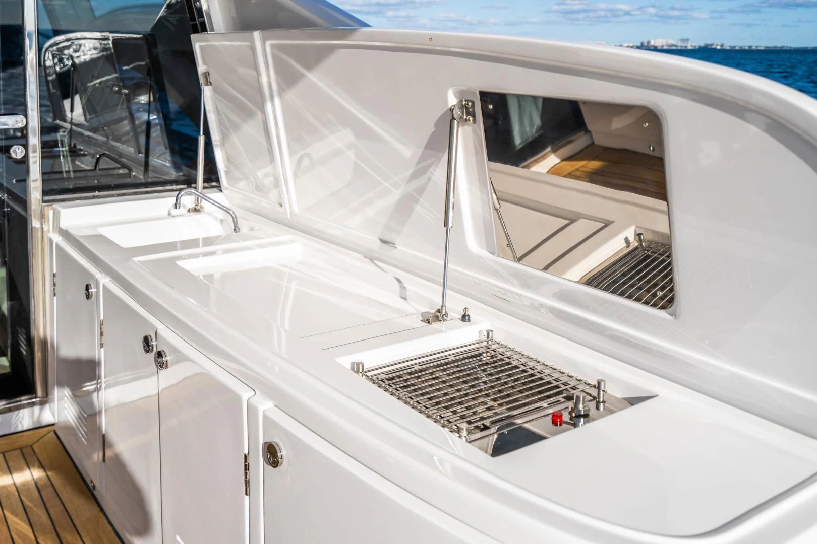 a white machine with a vent aboard PLANE II SEA Yacht for Sale