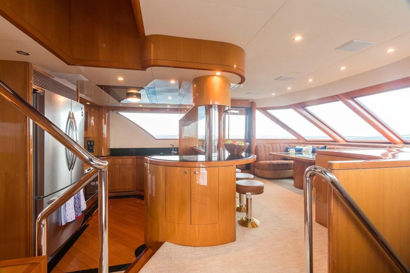 a large room with a fireplace aboard SOMEWHERE IN TIME Yacht for Sale