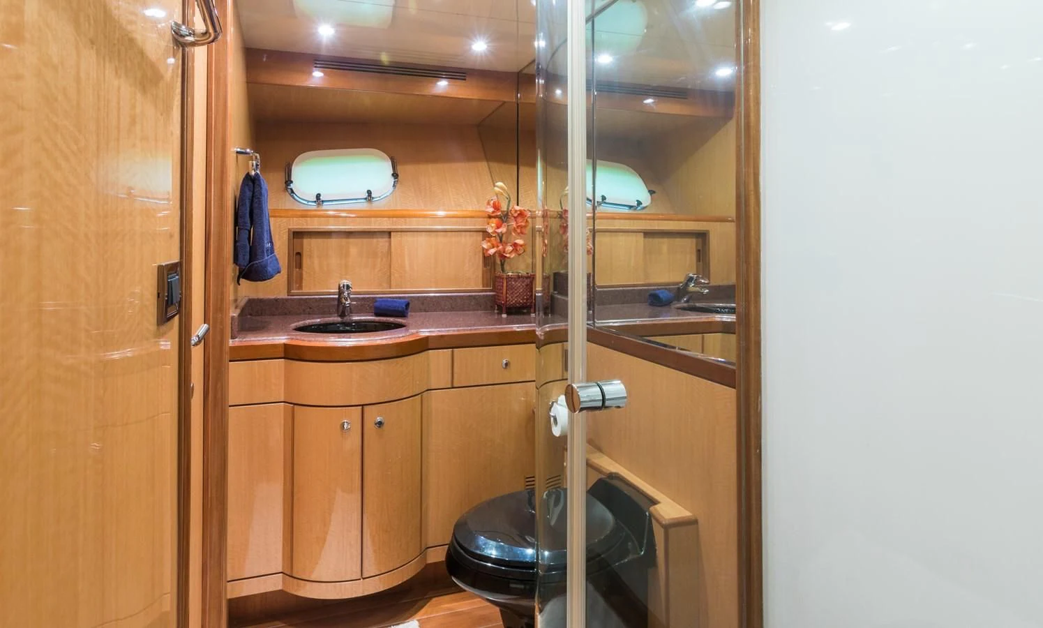 a bathroom with a sink and a mirror aboard SOMEWHERE IN TIME Yacht for Sale