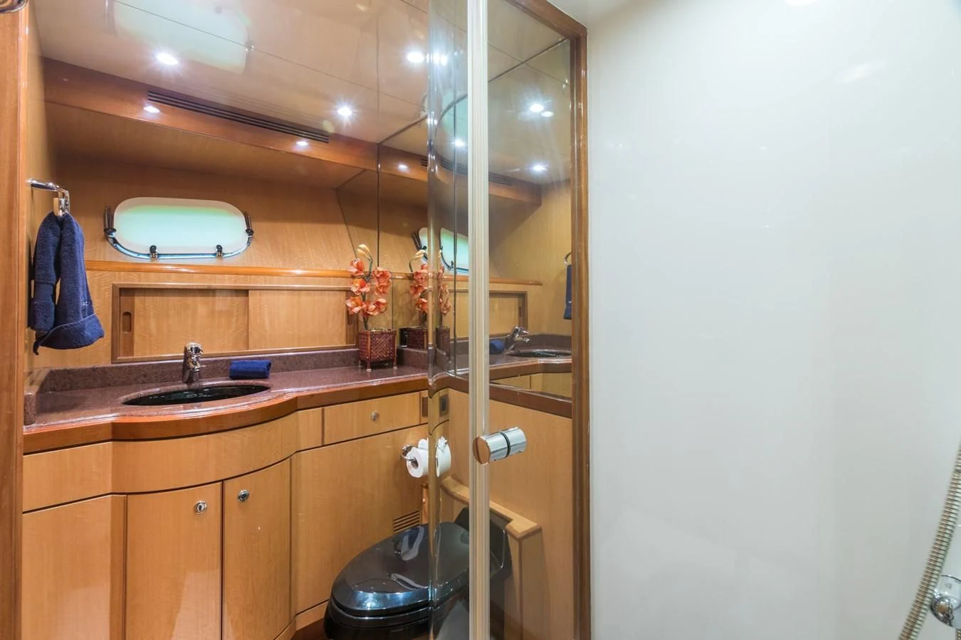 a bathroom with a sink and a mirror aboard SOMEWHERE IN TIME Yacht for Sale