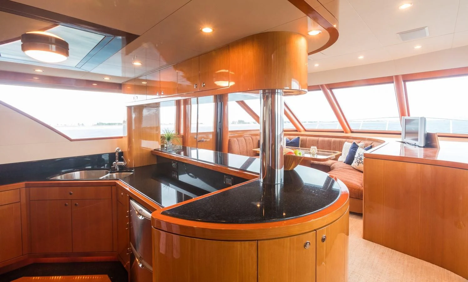 a kitchen with a large island aboard SOMEWHERE IN TIME Yacht for Sale