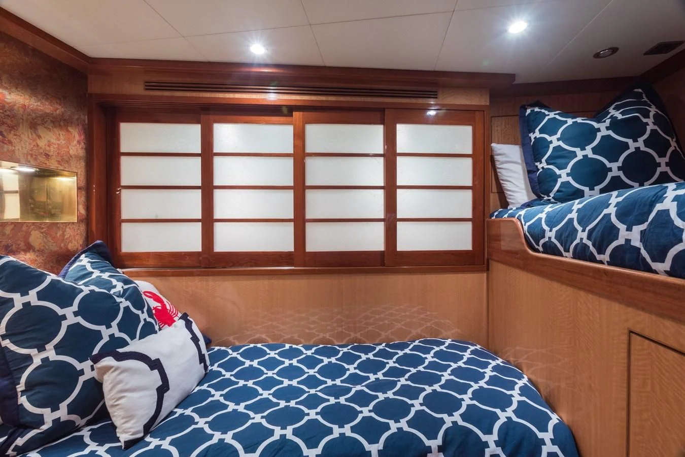 a room with a bed and a window aboard SOMEWHERE IN TIME Yacht for Sale