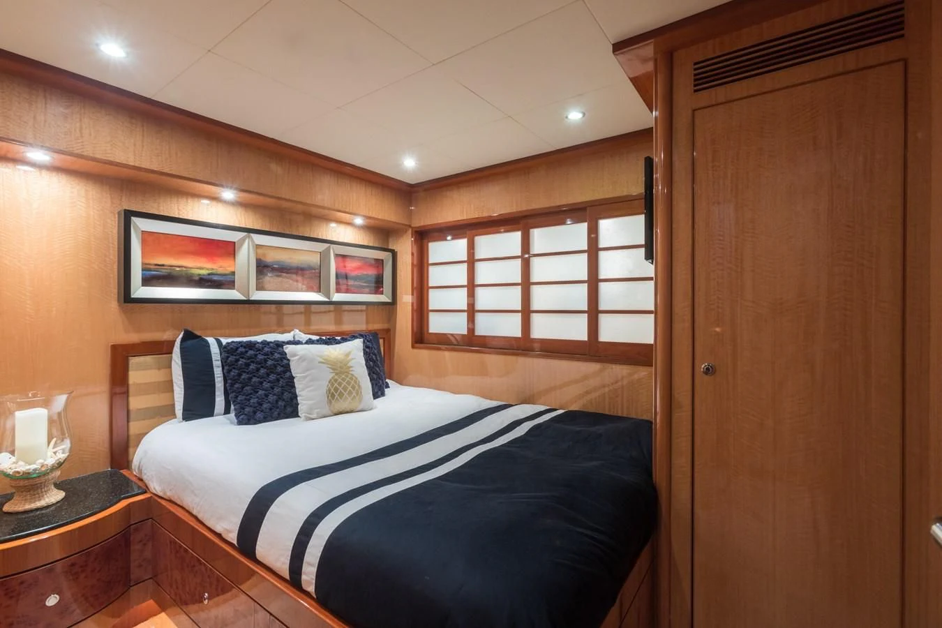 a bed in a room aboard SOMEWHERE IN TIME Yacht for Sale