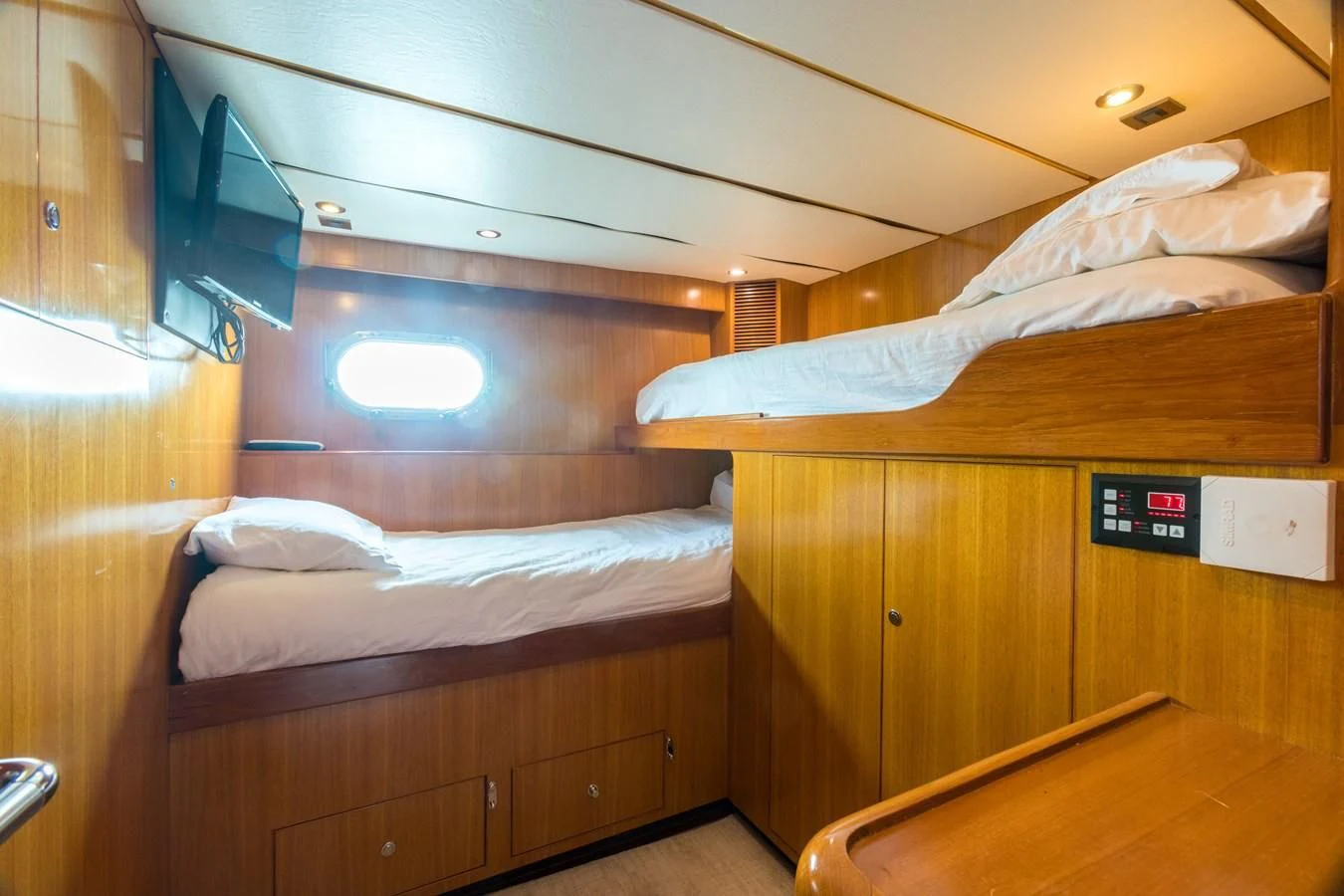 a room with bunk beds aboard SOMEWHERE IN TIME Yacht for Sale
