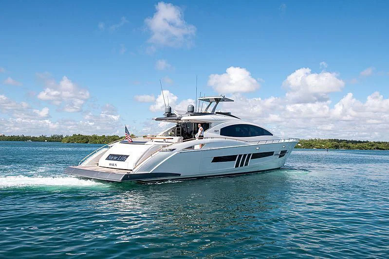 a white yacht on the water aboard NEW LIFE Yacht for Sale