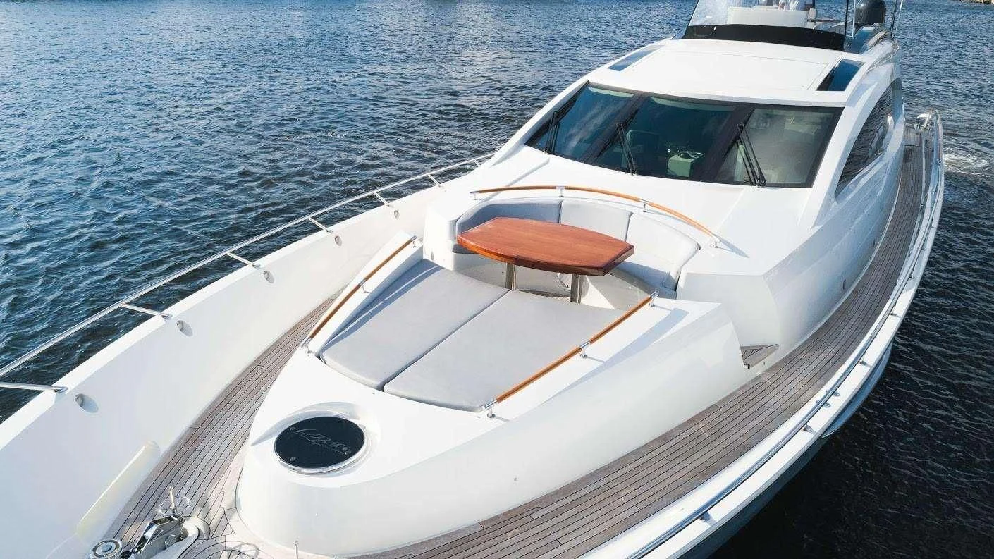 a white boat on the water aboard NEW LIFE Yacht for Sale