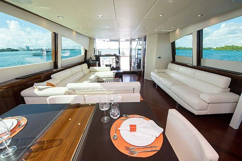 a living room with a large window aboard NEW LIFE Yacht for Sale