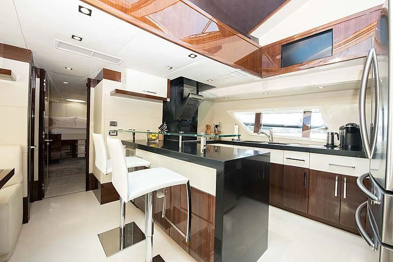 a kitchen with a large island aboard NEW LIFE Yacht for Sale