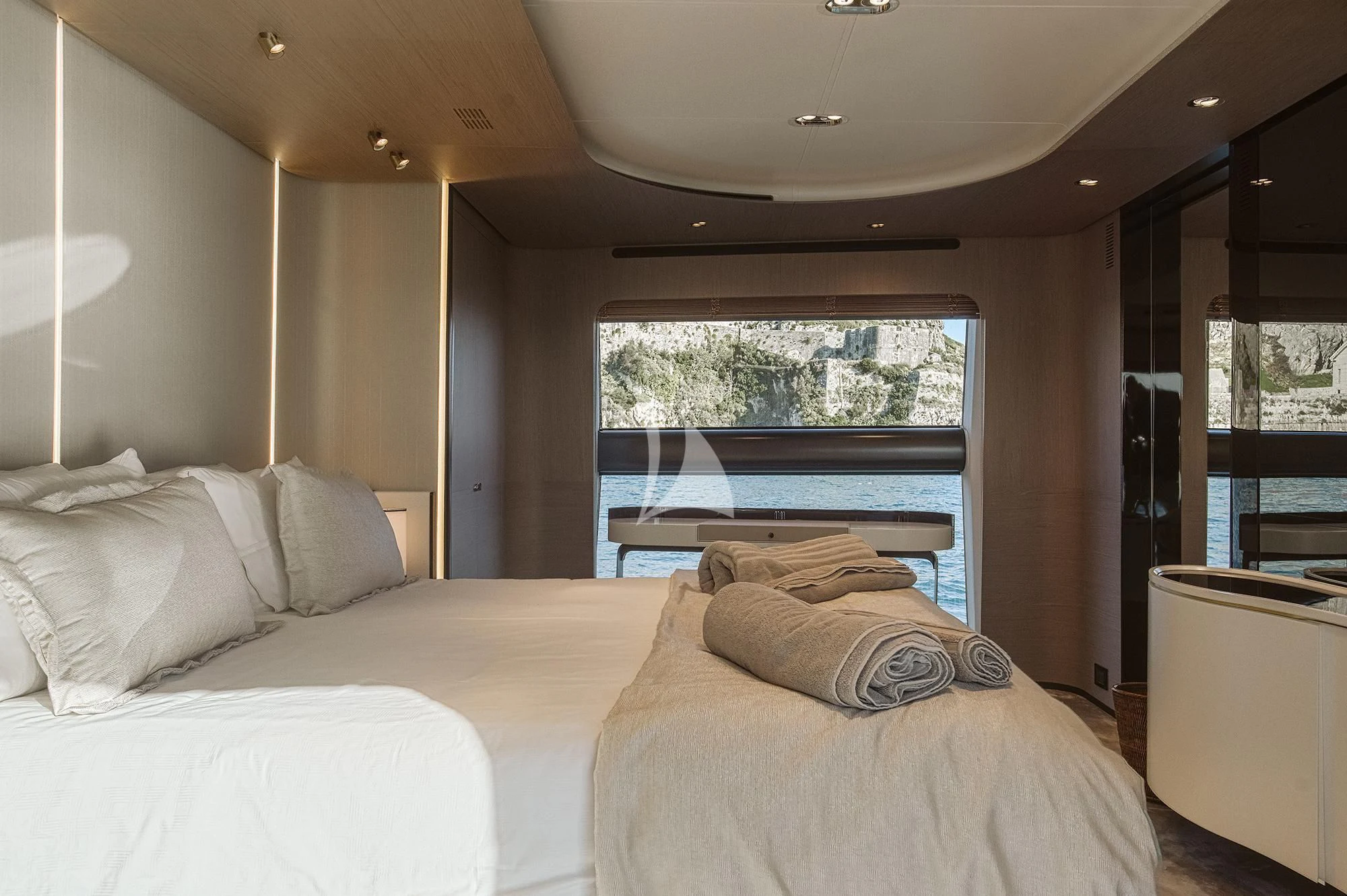 a bed in a room aboard AGIO Yacht for Charter