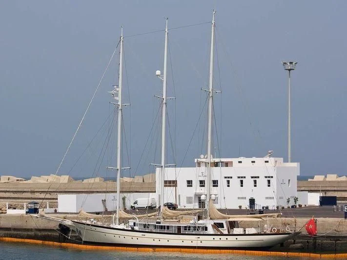 a boat docked in a harbor aboard EL BOUGHAZ I Yacht for Sale
