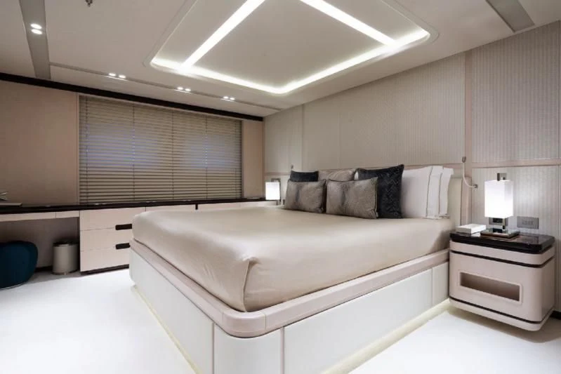 a bed in a room aboard LADY A Yacht for Sale