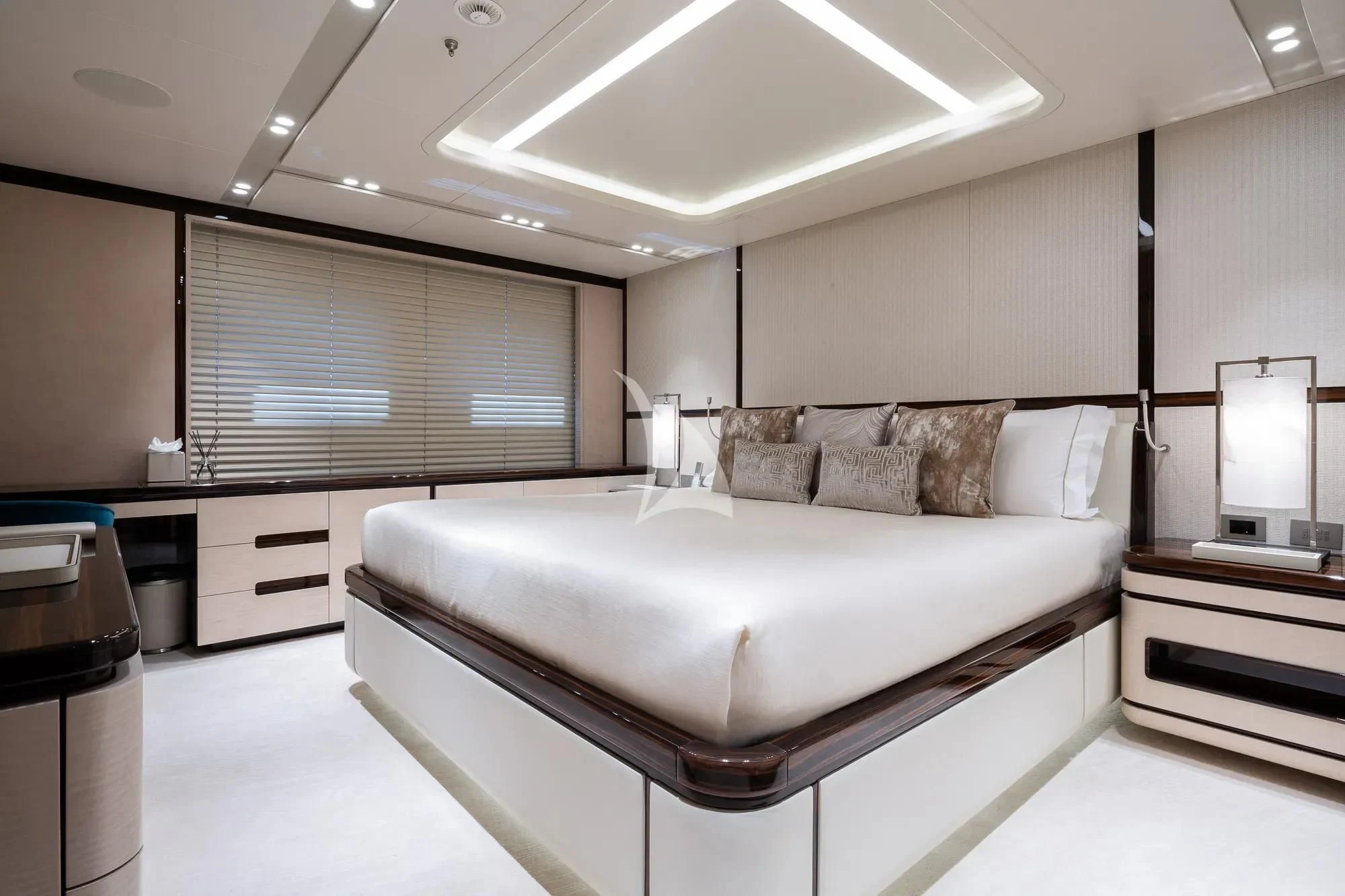 a large white bed in a room aboard LADY A Yacht for Sale