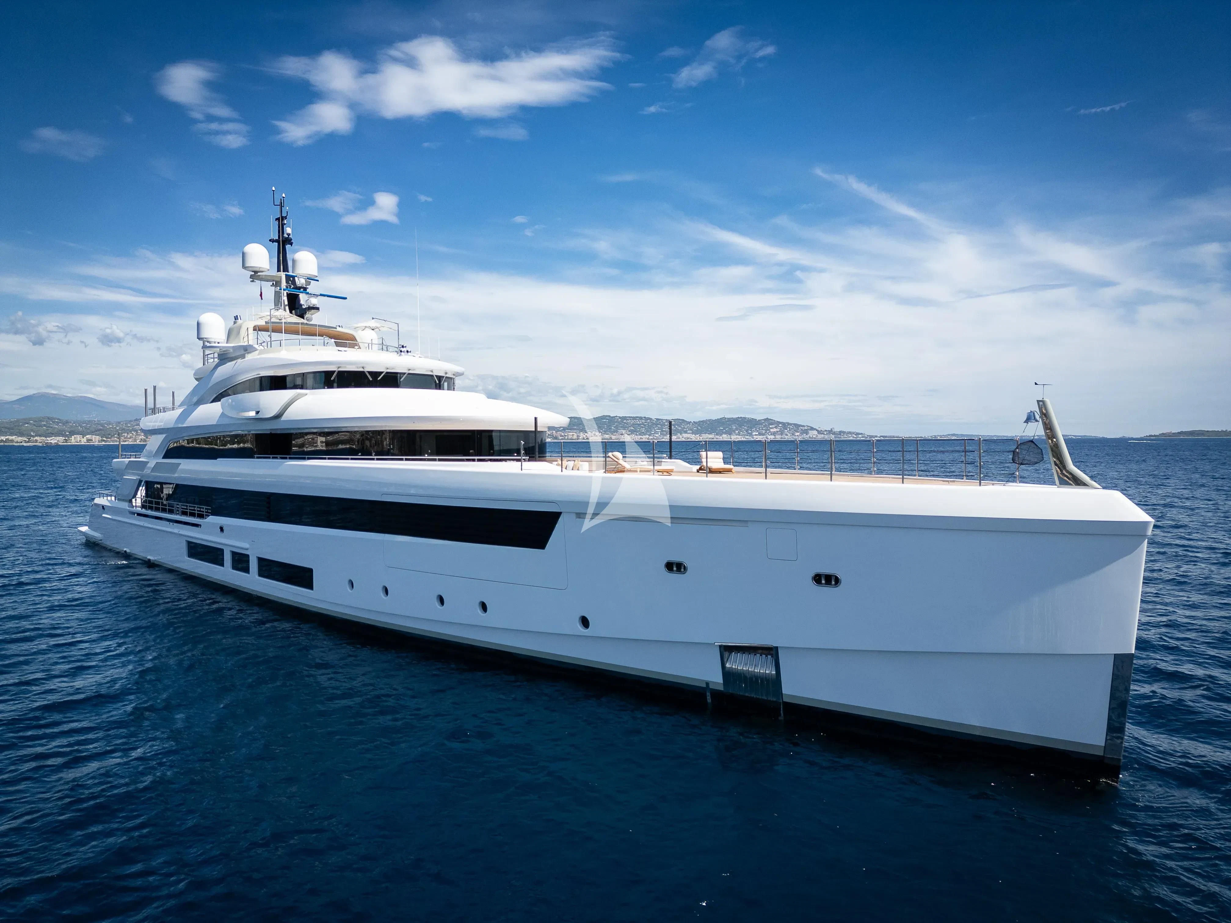 a large white ship in the water aboard LADY A Yacht for Sale