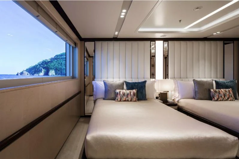 a bed in a room aboard LADY A Yacht for Sale