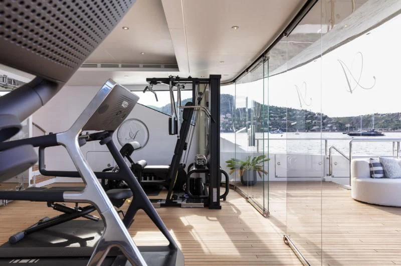 a treadmill on a deck aboard LADY A Yacht for Sale