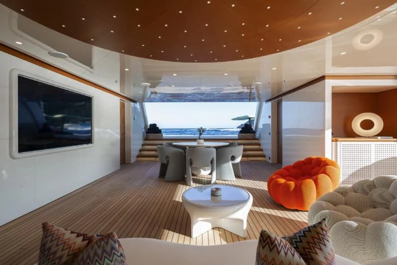 a living room with a large window aboard LADY A Yacht for Sale