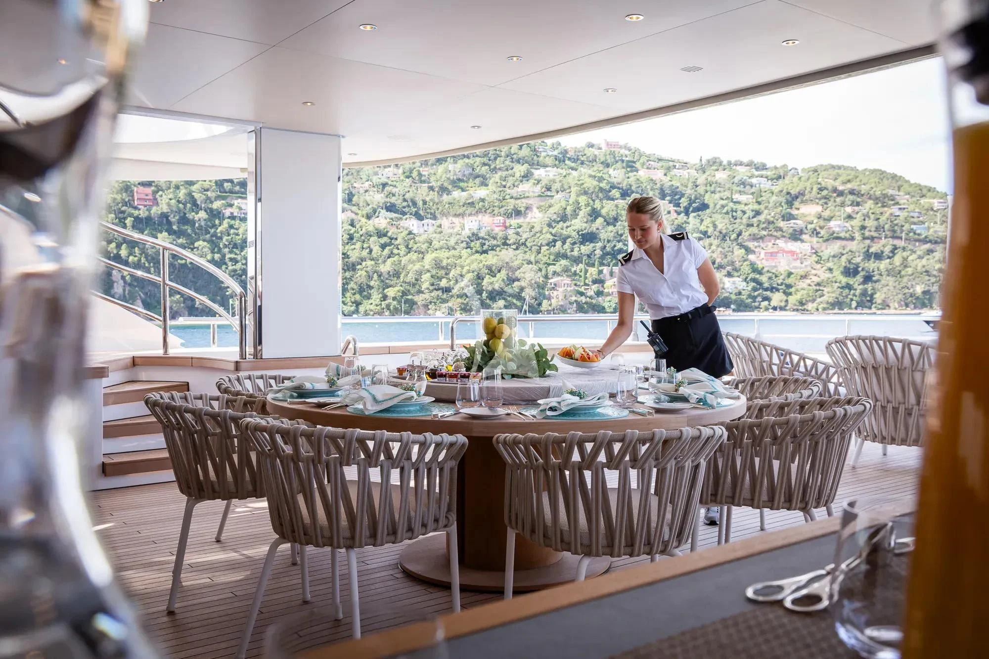 a person sitting at a table aboard LADY A Yacht for Sale