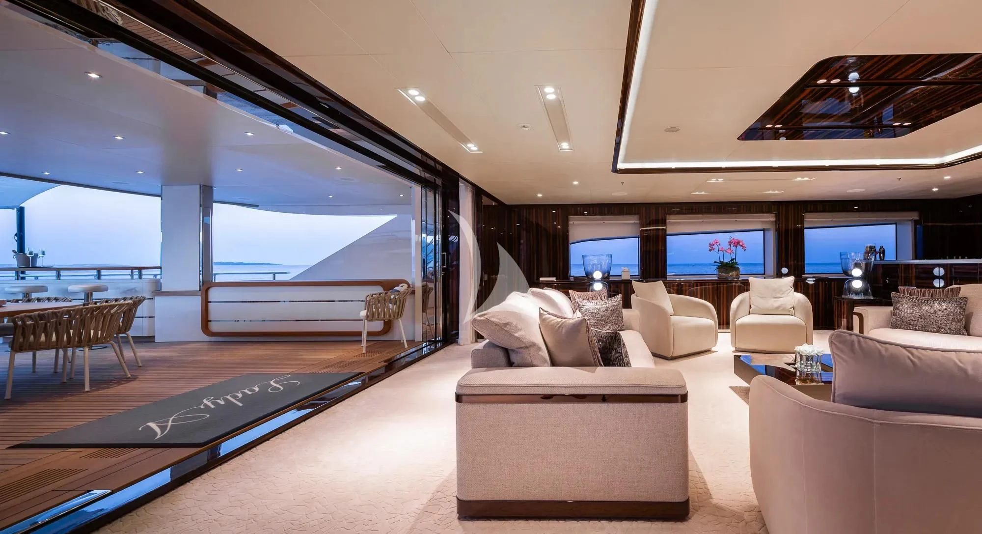 a large living room with a large window aboard LADY A Yacht for Sale