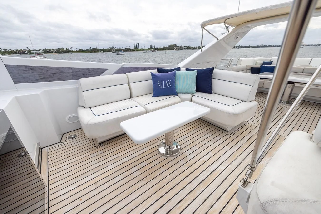a white couch on a deck aboard ENDLESS SUN Yacht for Sale