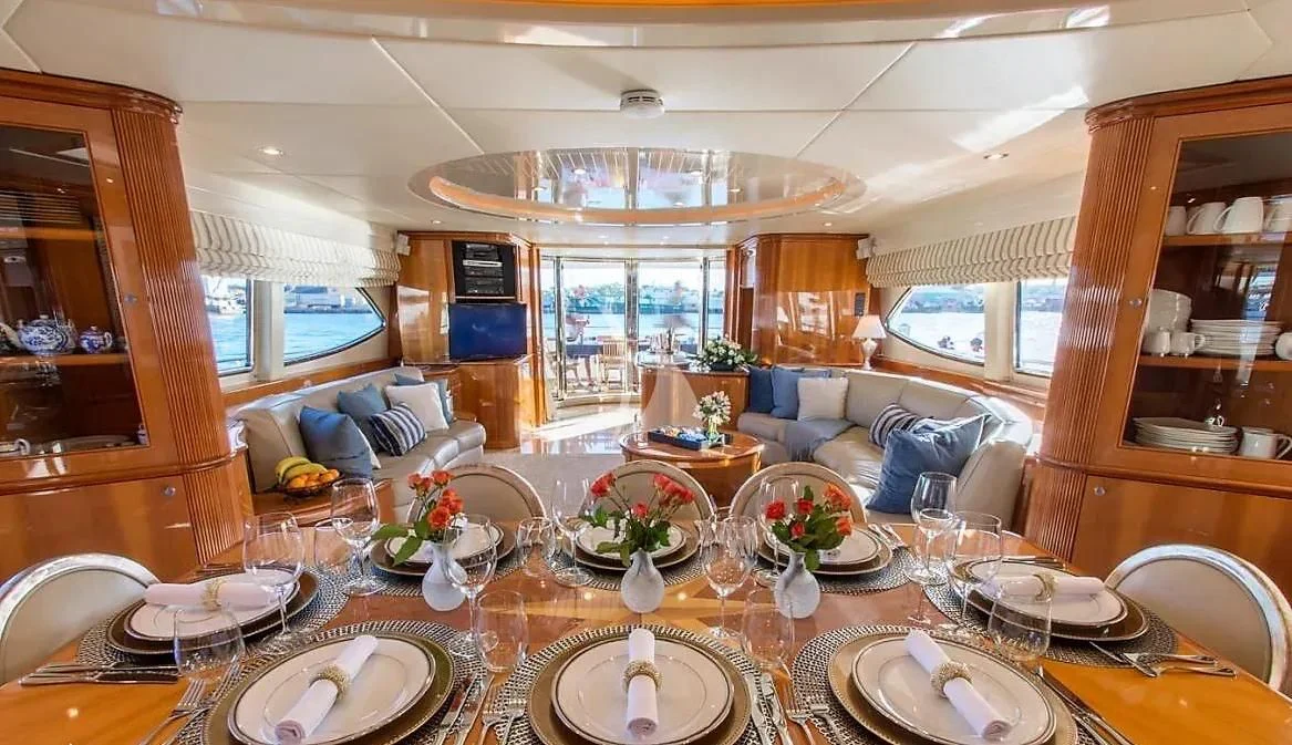a large dining room with a large table set for a meal aboard ENDLESS SUN Yacht for Sale