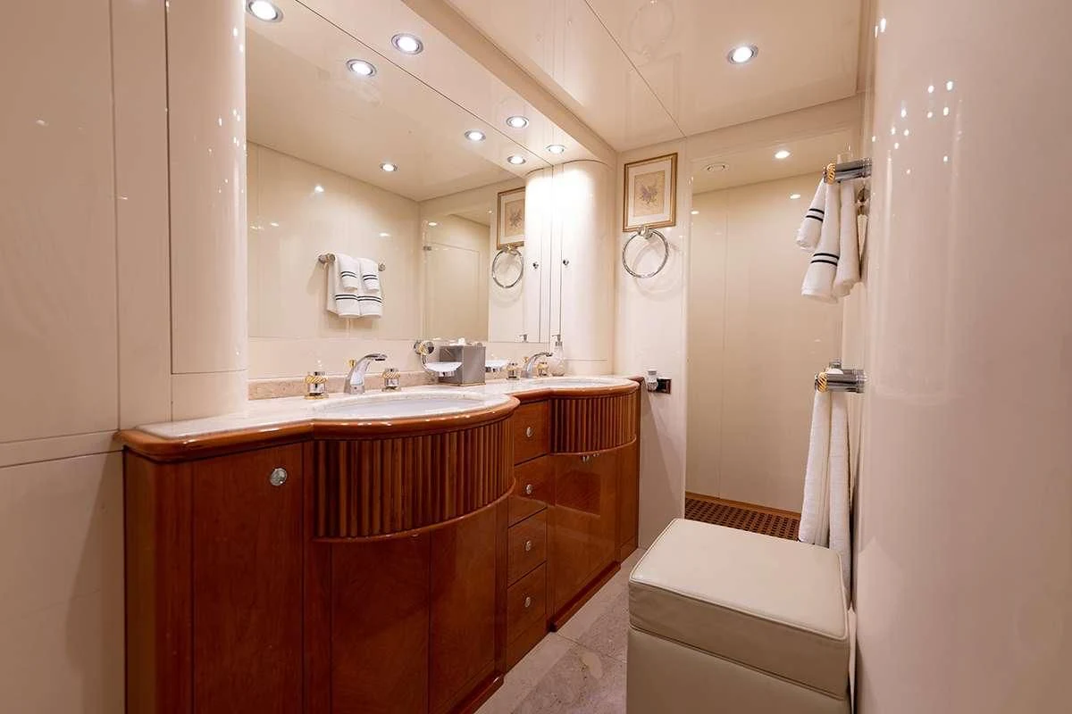 a bathroom with a sink and a mirror aboard ENDLESS SUN Yacht for Sale