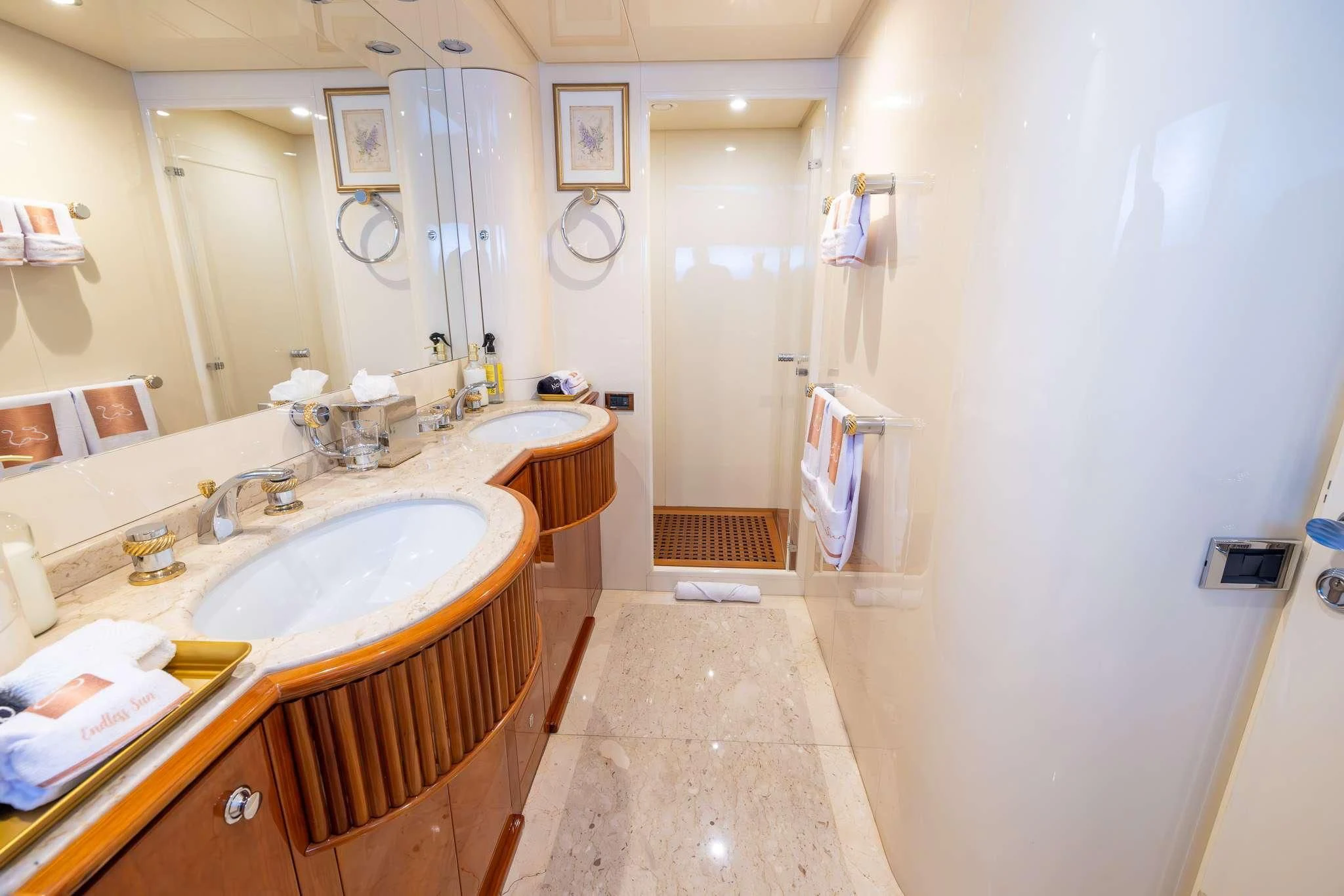 a bathroom with a sink and a mirror aboard ENDLESS SUN Yacht for Sale