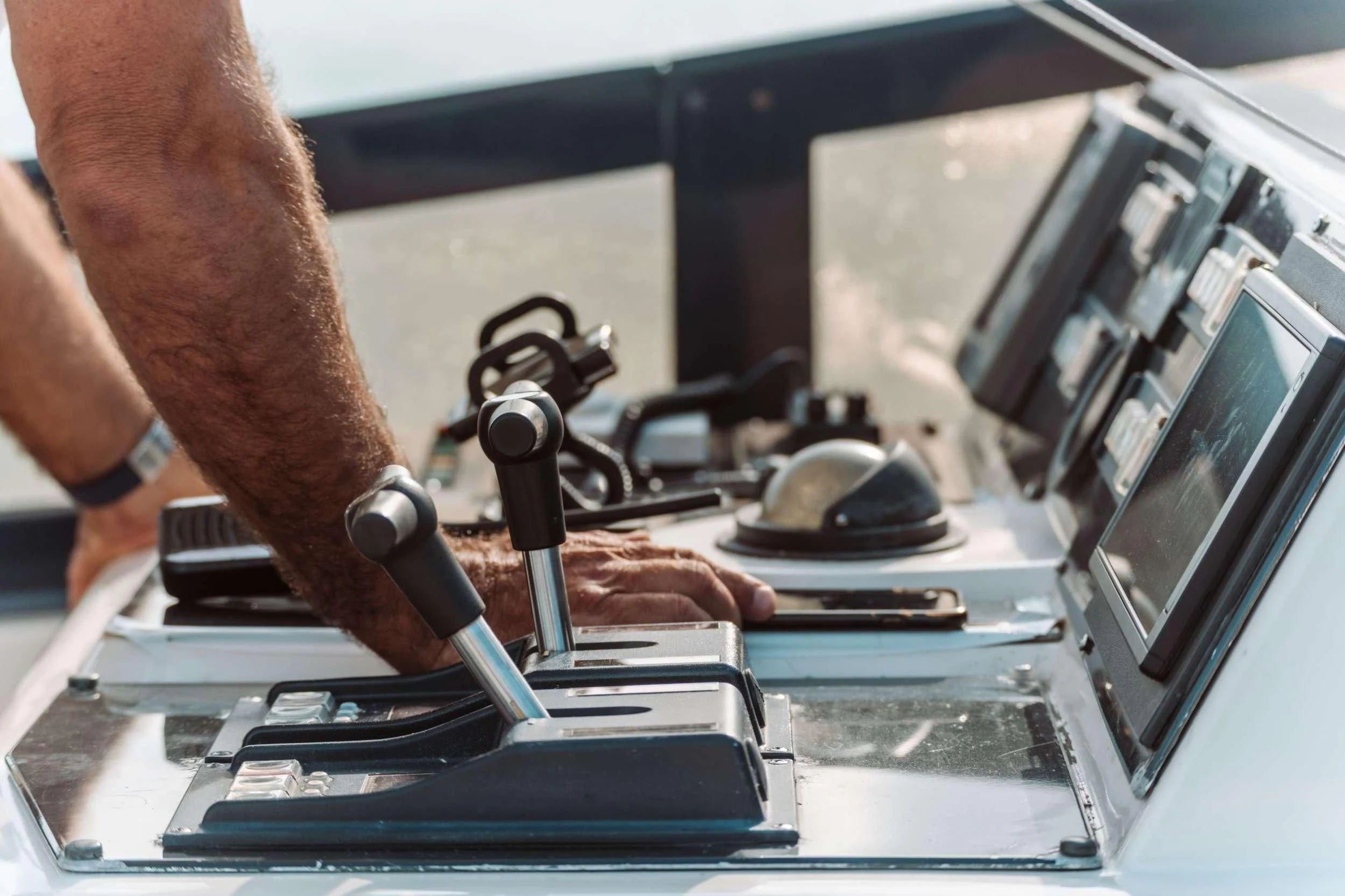 a man working on a computer aboard ENDLESS SUN Yacht for Sale