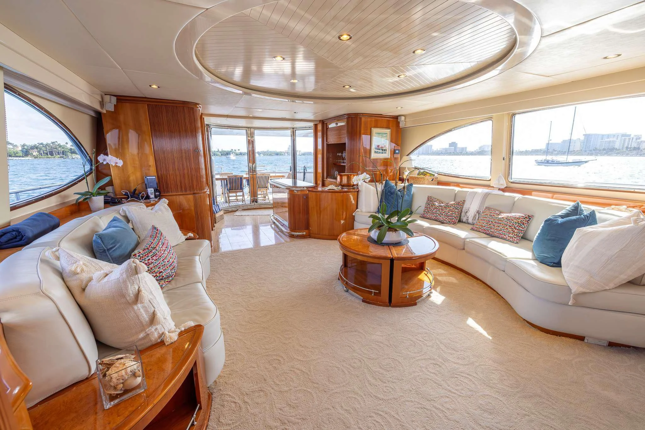 a living room with a large window aboard ENDLESS SUN Yacht for Sale