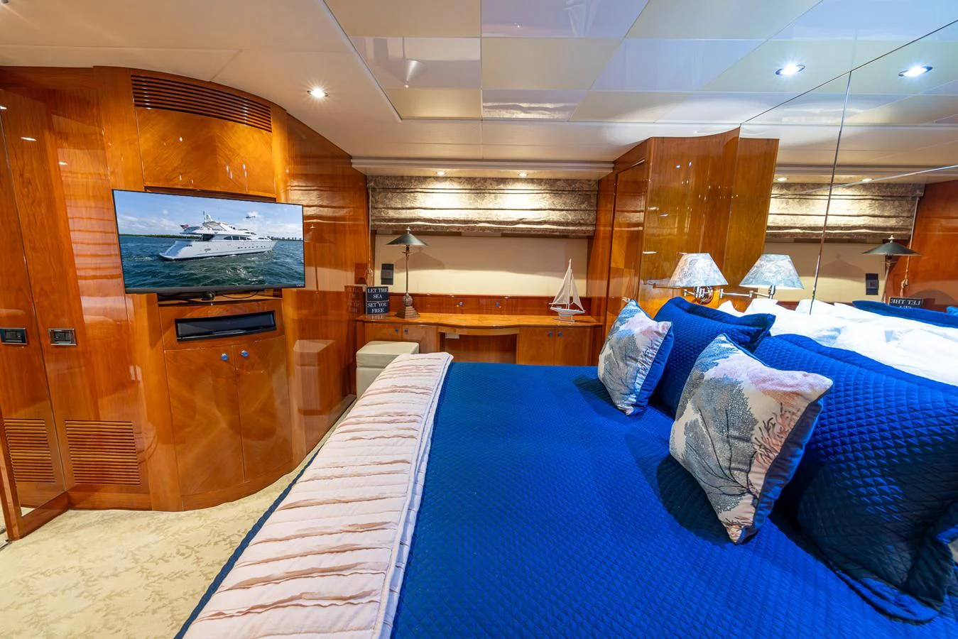 a room with a bed and a television aboard ENDLESS SUN Yacht for Sale