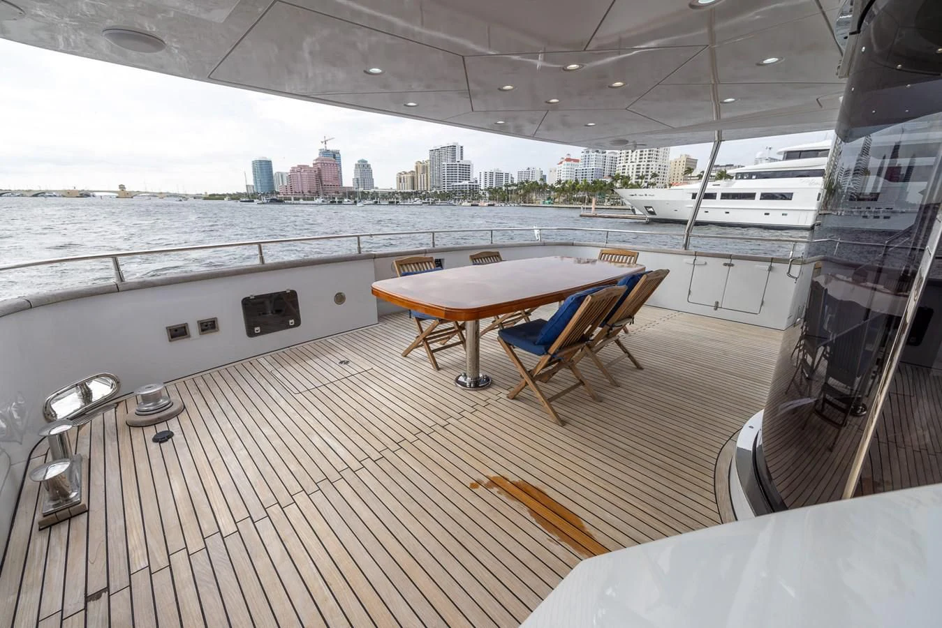a table and chairs on a deck aboard ENDLESS SUN Yacht for Sale
