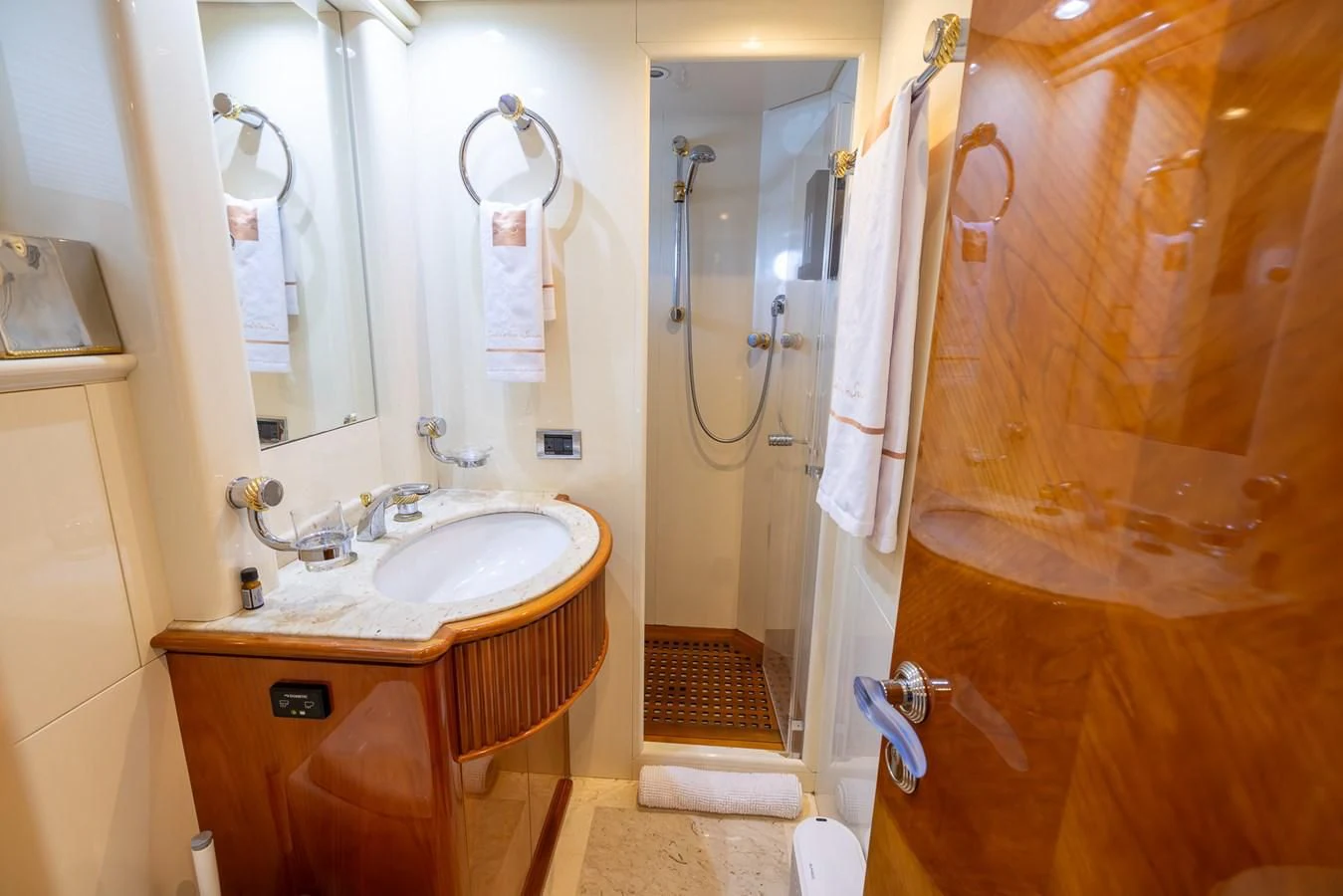 a bathroom with a sink and a mirror aboard ENDLESS SUN Yacht for Sale