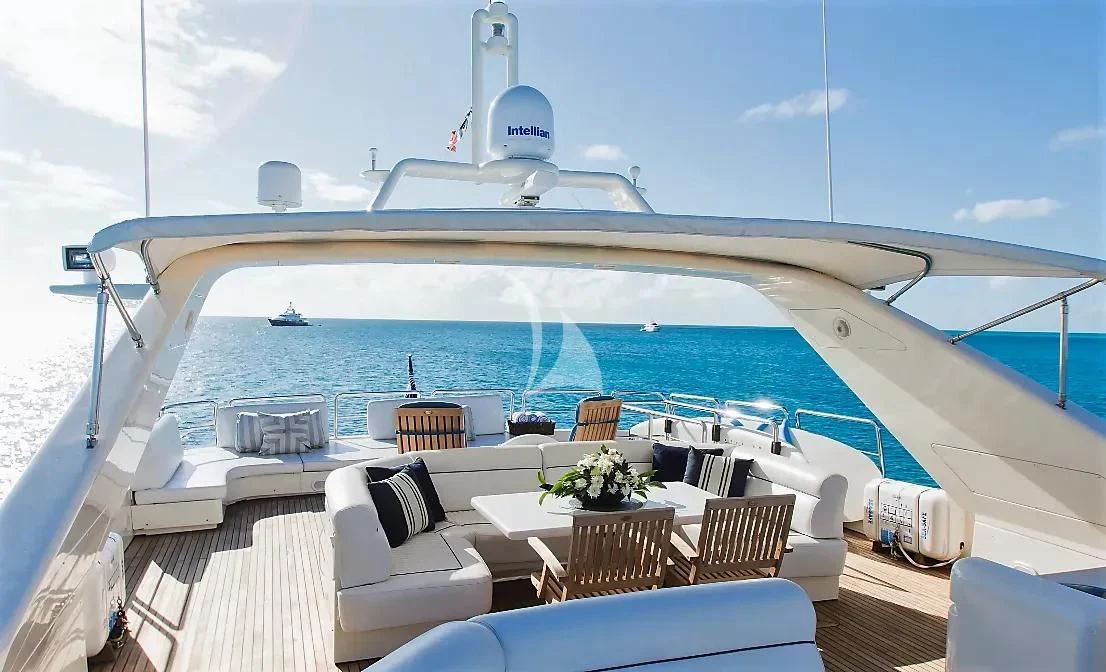 a large cruise ship with chairs and tables on a deck aboard ENDLESS SUN Yacht for Sale