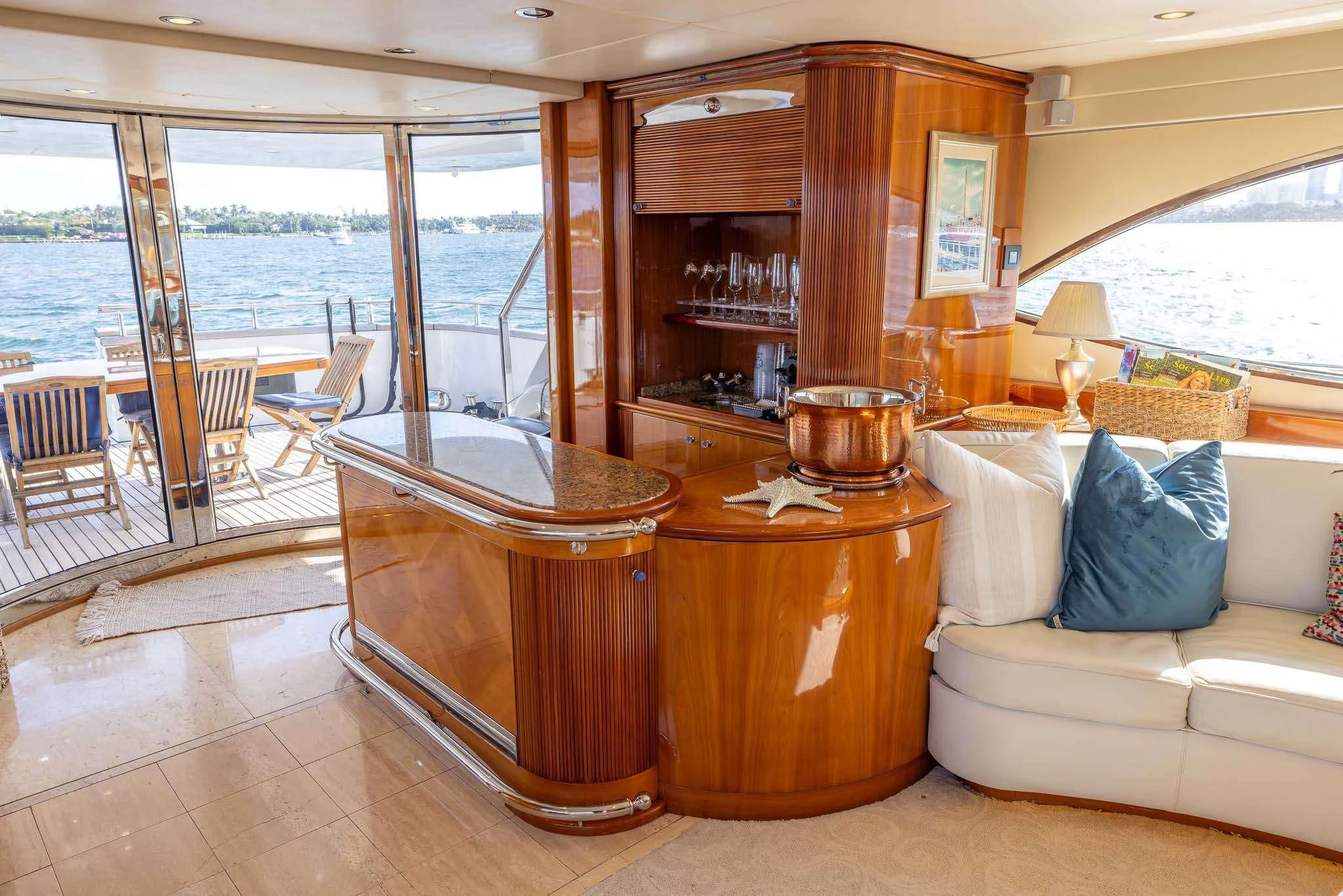 a living room with a fireplace aboard ENDLESS SUN Yacht for Sale