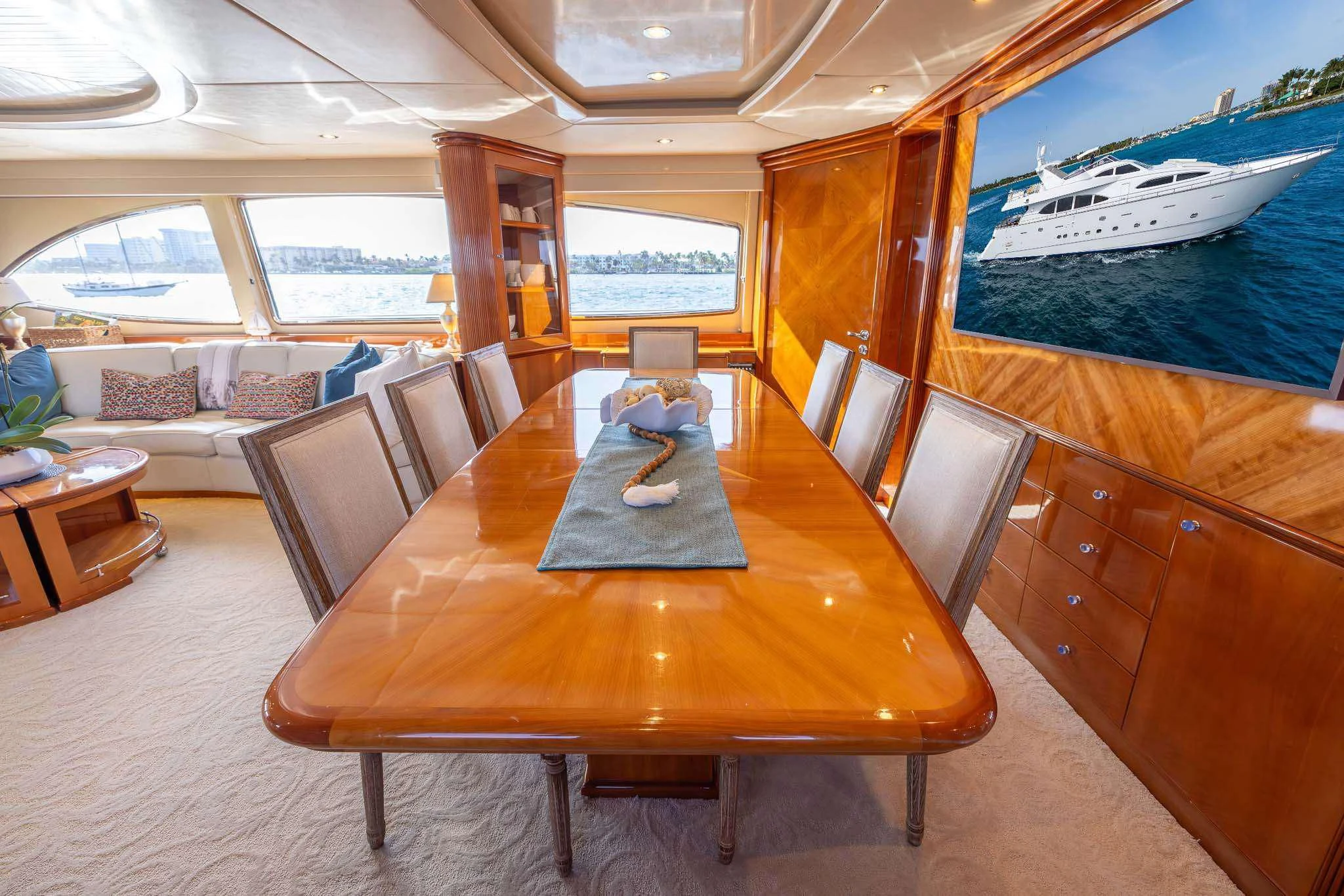 a table with chairs around it aboard ENDLESS SUN Yacht for Sale
